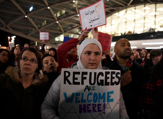 Iranian couple, Syrian mother and baby stopped at DIA as protesters rallied in main terminal against new policy Iranian couple, Syrian mother and baby stopped at DIA as protesters rallied in main terminal against new policy